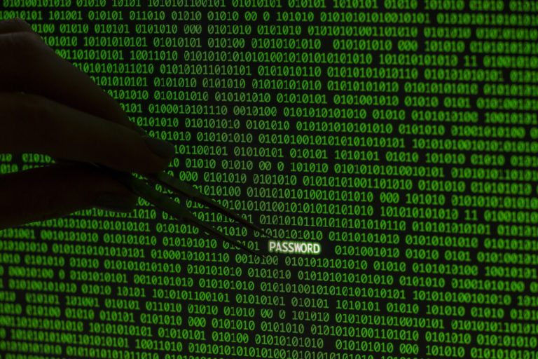 password-with-hand-holding-tweezers-binary-code