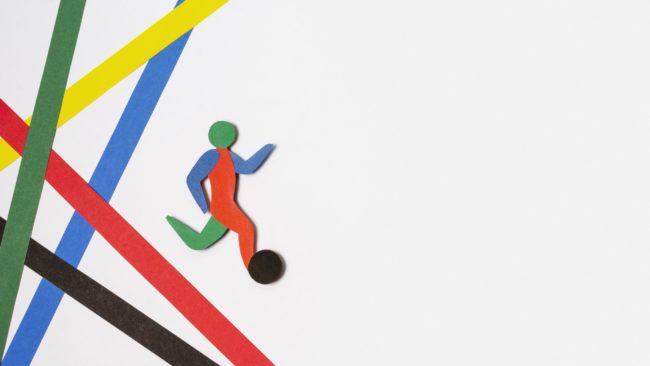 top-view-arrangement-paper-style-abstract-football-player