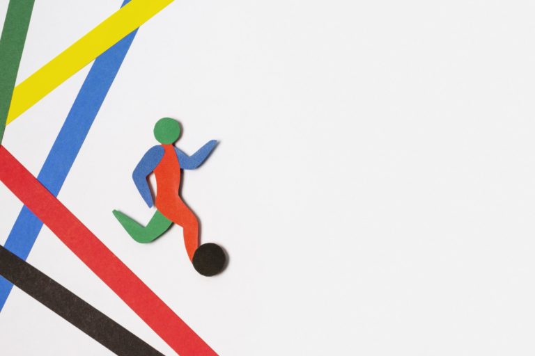 top-view-arrangement-paper-style-abstract-football-player